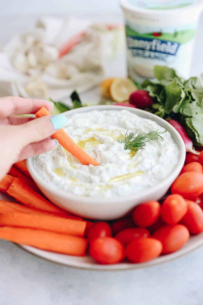 tzatziki dip in a bowl with veggies