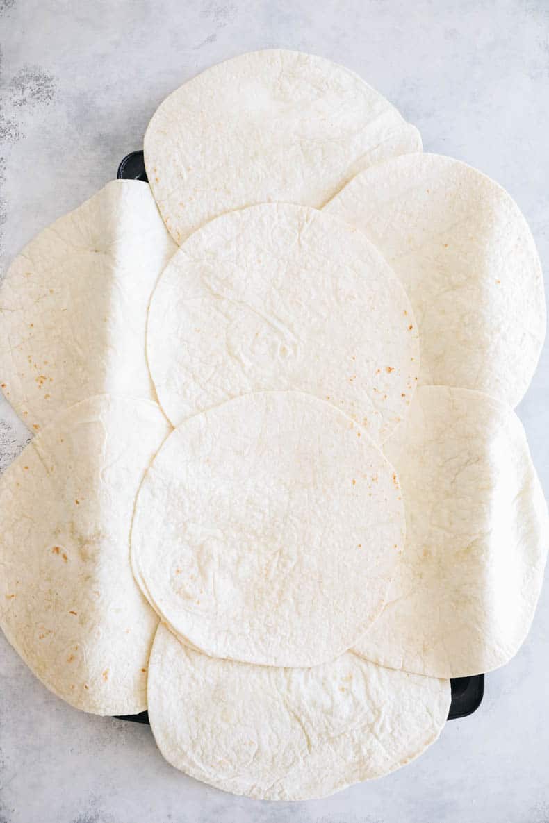 tortillas on a sheet pan