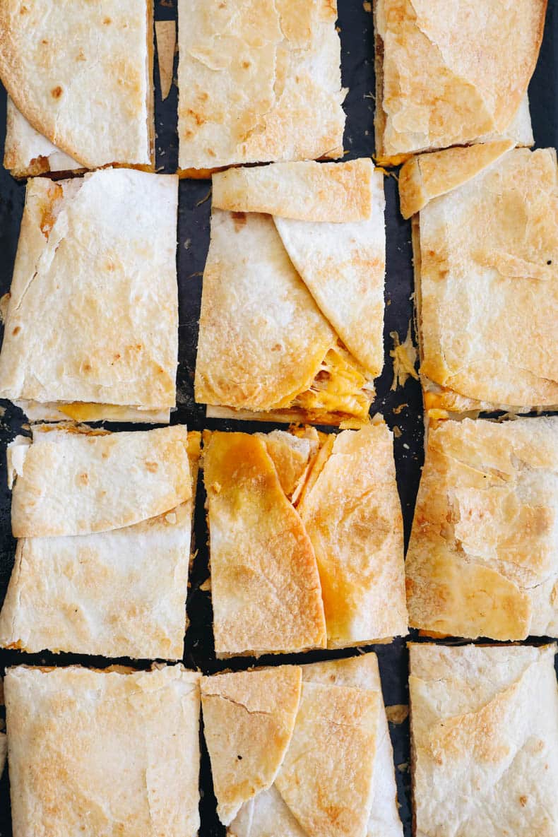 baked sheet pan quesadillas cut into 12 squares.