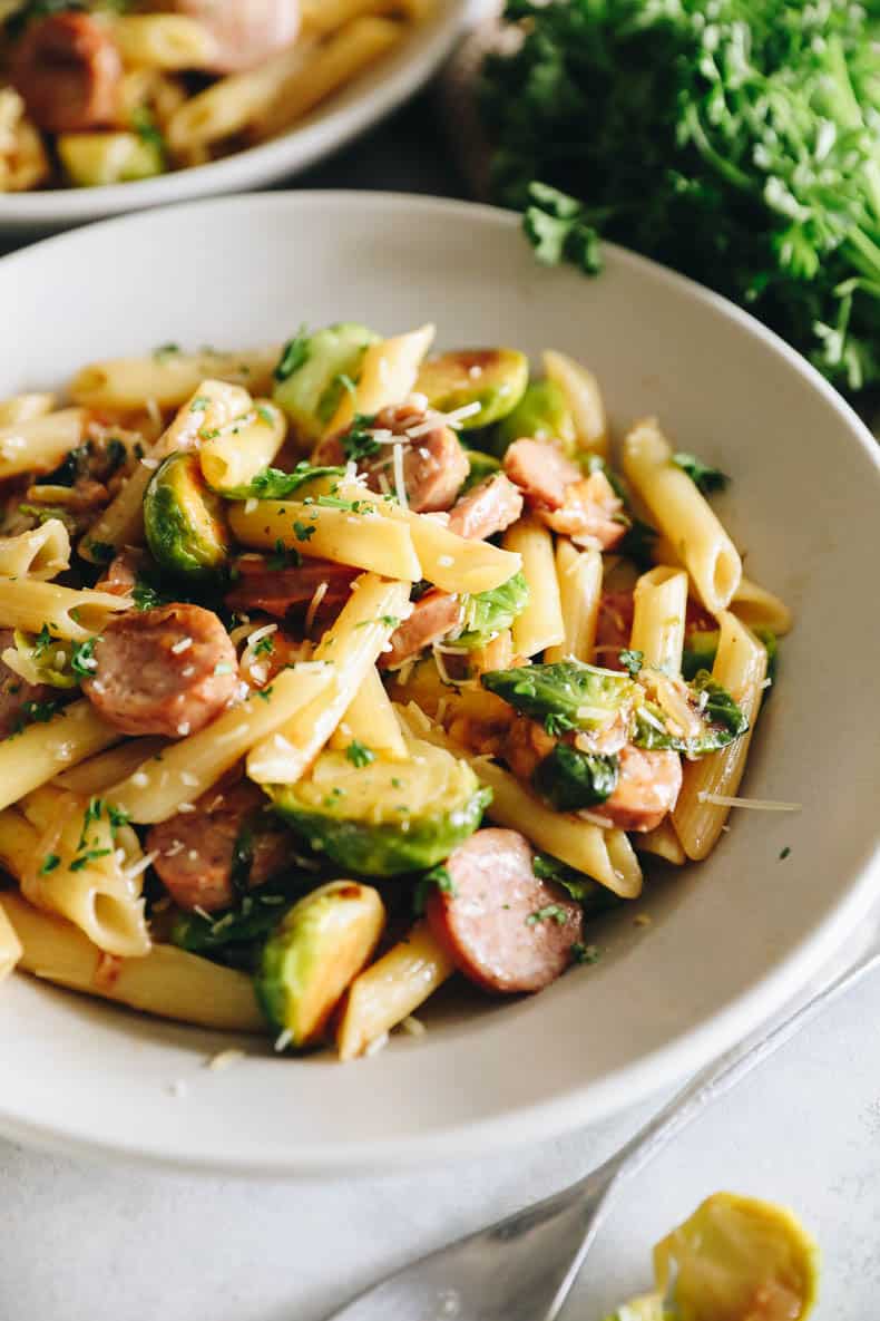 Chicken Sausage Pasta in a white shallow bowl.